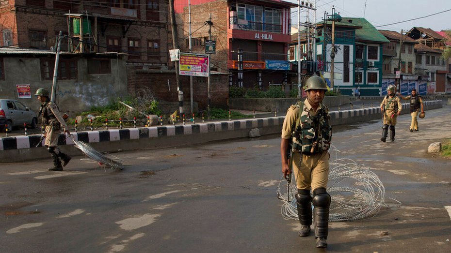 CRPF personnel enforcing a lockdown in Srinagar- Photo credit AP