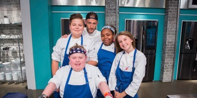 Fuller Goldsmith, front, along with Milo Fleming, Guest Judge Michael Voltaggio, Jasmine Bell and Maxine Sutton on ‘Top Chef Junior.'