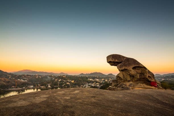 Toad looking figure in this image is a stone structure on mountain in Mt. Abu of Rajasthan, India.