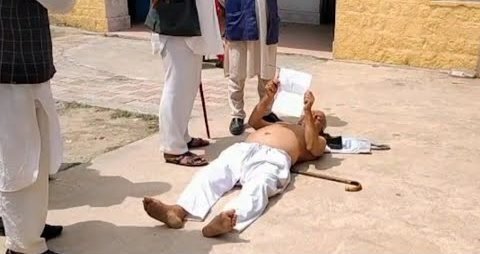 Elderly man took off his shirt, staging a protest against the hike in availing revenue records, outside SDM office in Doda’s Thathri