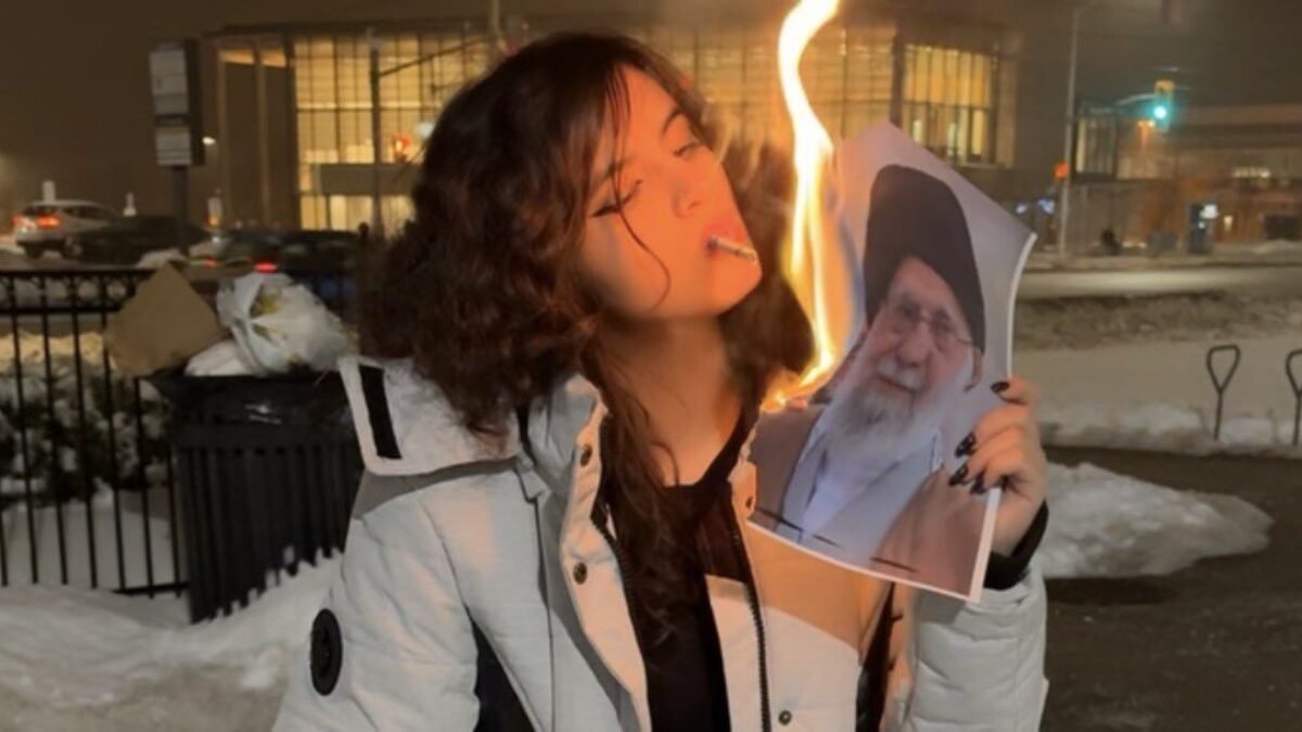 Fact Check: Viral Image of Woman Lighting Cigarette With Photo of Iran's  Supreme Leader Did Not Originate in Iran