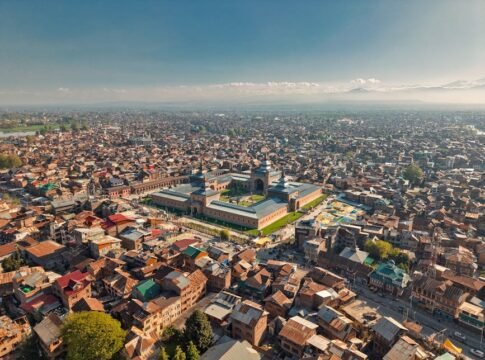 A breathtaking aerial view showcasing the iconic Jamia Masjid amidst the bustling cityscape of Srinagar. A breathtaking aerial view showcasing the iconic Jamia Masjid amidst the bustling cityscape of Srinagar.