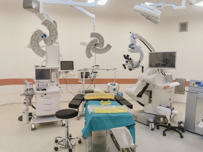 A state-of-the-art operating room fully equipped with advanced medical devices and surgical tools.
