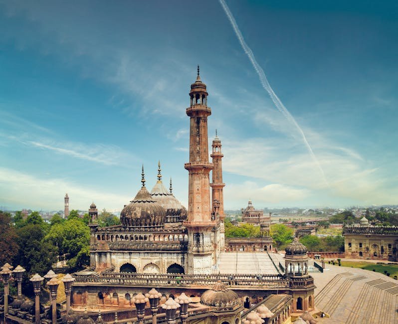 Lucknow Experiences Sudden Chill Following Unseasonal Rainfall; IMD Issues Weekly Forecast A striking view of a historic mosque with minarets in Lucknow, India, showcasing architectural beauty.