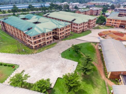 Aerial shot of a university campus in Ota, Nigeria, showcasing modern educational architecture. Aerial shot of a university campus in Ota, Nigeria, showcasing modern educational architecture.