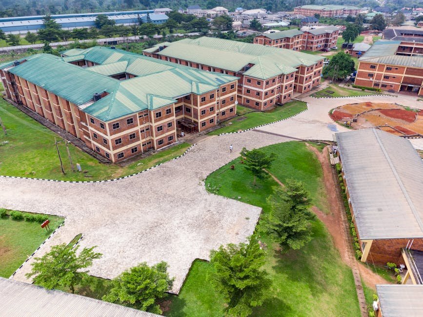 Jammu and Kashmir: SKUAST-K Vice Chancellor Selected for Fulbright-Nehru Award Aerial shot of a university campus in Ota, Nigeria, showcasing modern educational architecture.