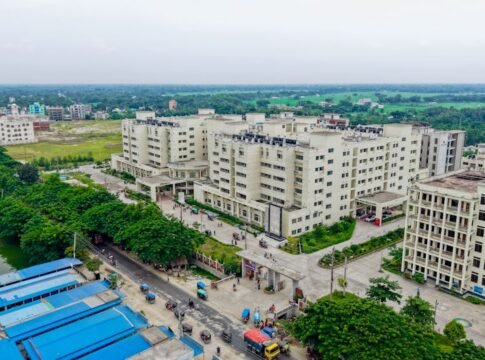 Aerial view of the Kushtia Medical College campus showing modern architecture and lush surroundings. Aerial view of the Kushtia Medical College campus showing modern architecture and lush surroundings.
