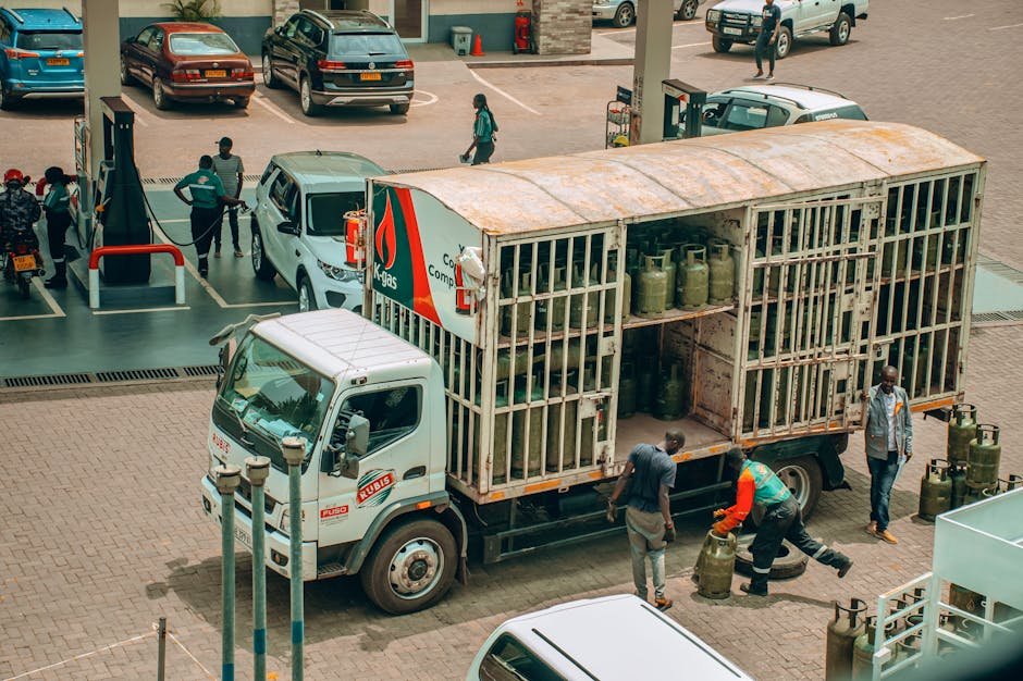 Ludhiana Administration Eases LPG Access for Migrant Workers Amidst Shortage Concerns An LPG gas truck making a delivery at a busy urban station.