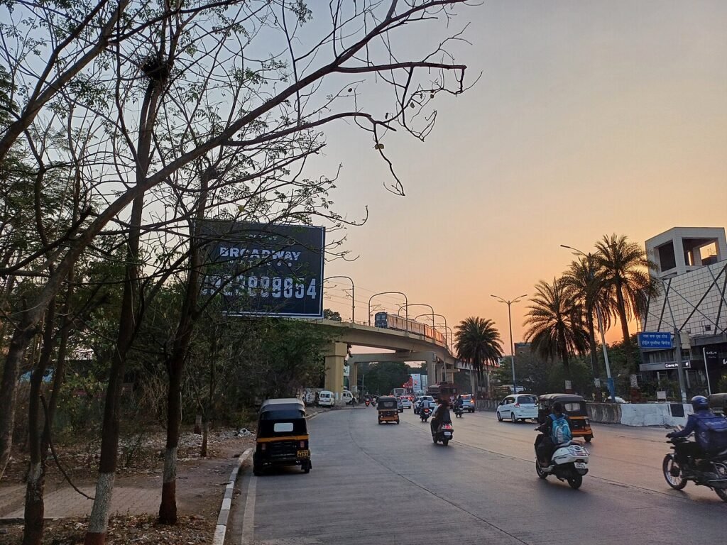 Beauty of Pune Metro during sunset captured when it is moving from Yerwada to Kalyani Nagar station