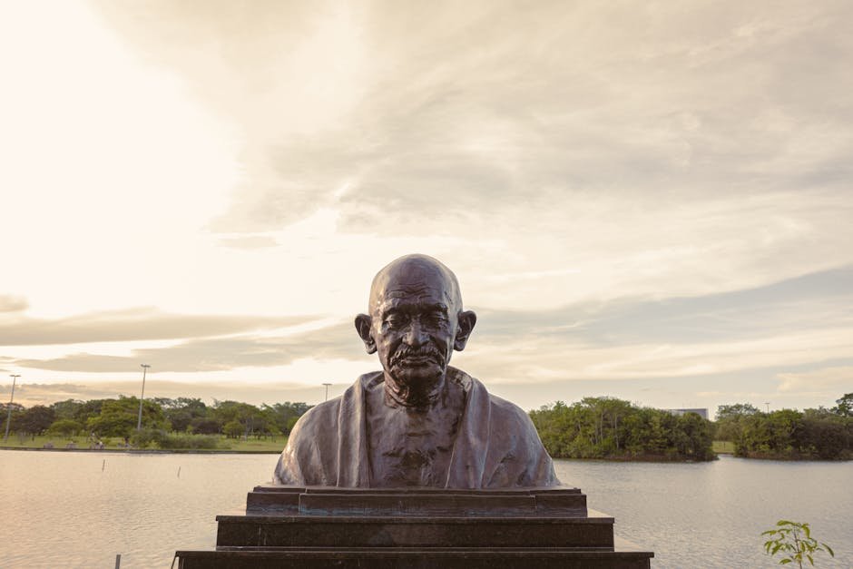 Vice-President to Headline IGNOU’s 39th Convocation in Delhi; Regional Centres to Participate Bronze bust of Mahatma Gandhi with serene lake backdrop in Brasília, Brazil.