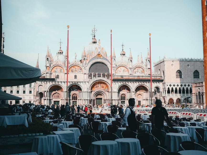 Mark Carney’s Liberal Party Gains Edge as MP Marilyn Gladu Defects Capture of St. Mark's Basilica in Venice with outdoor seating and tourists on a sunny day.