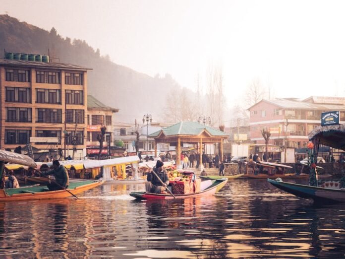 Colorful boats and bustling activity at Dal Lake, Kashmir, capturing a lively morning scene.