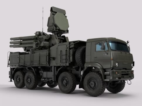 Detailed image of a military vehicle equipped with advanced radar and weaponry systems.