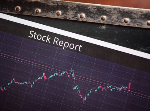Detailed view of a stock report displaying a market performance graph with data trends. Detailed view of a stock report displaying a market performance graph with data trends.