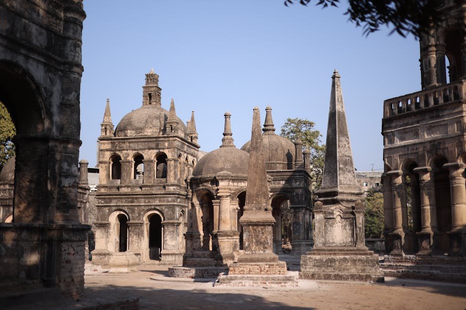 Delhi Assembly Speaker Receives Z Category Security Amid Bomb Threats Explore ancient architectural structures in a sunlit historical cemetery, showcasing rich heritage.