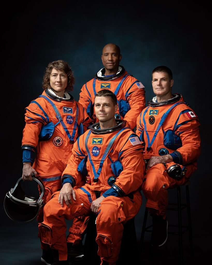 LOCATION: Bldg. 8, Room 183 - Photo Studio. SUBJECT: Official crew portrait for Artemis II, clockwise from left: NASA Astronauts Christina Koch, Victor Glover, Canadian Space Agency Astronaut Jeremy …