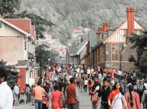Lively crowd on a street in Shimla, India, surrounded by historic architecture and scenic hills. Lively crowd on a street in Shimla, India, surrounded by historic architecture and scenic hills.