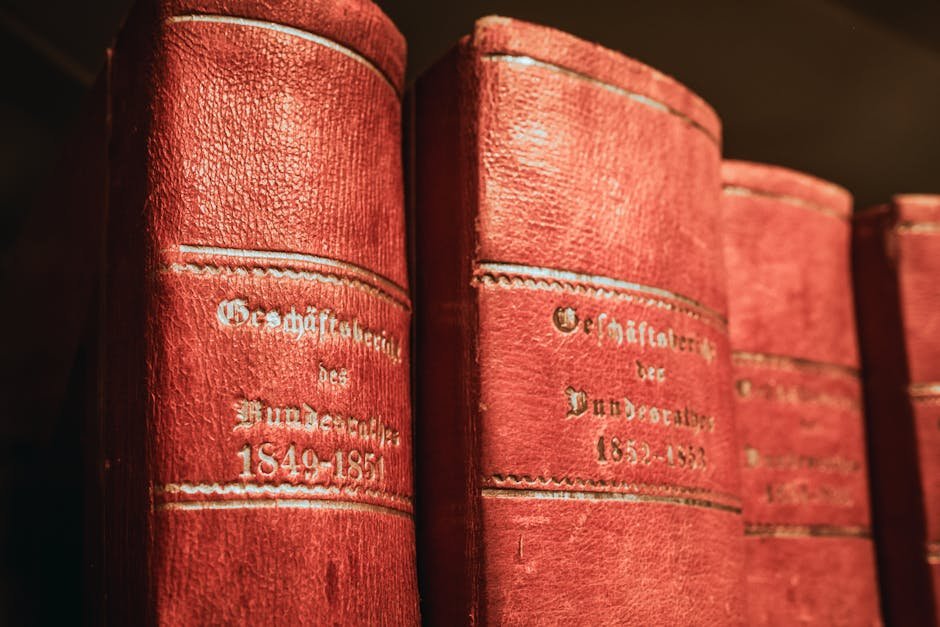 Jammu and Kashmir Legislators Raise Student Evacuation, Infrastructure Gaps, and Financial Audit Issues Red leather-bound parliamentary books from 19th century in Bern library, Switzerland.