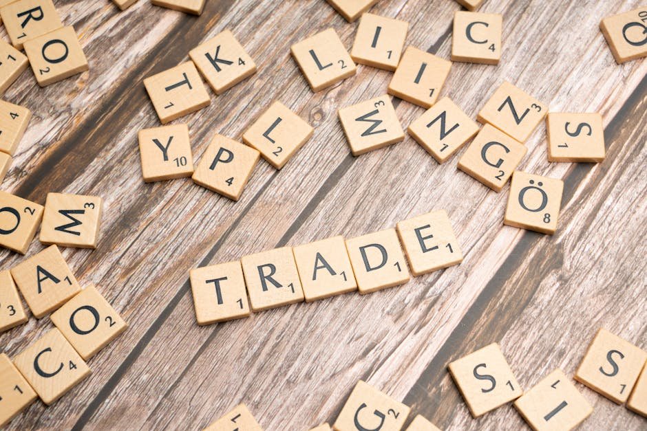 India-UK Free Trade Pact Poised for May Implementation, Official States Scrabble letter tiles spelling 'trade' on a wooden surface, illustrating business concepts.