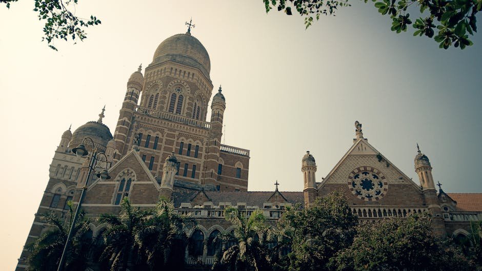 Mumbai BMC to Prioritise Low-Lying Embankments in Mithi River Desilting to Mitigate Flood Risk Stunning Gothic architecture of BMC headquarters in Mumbai, India.