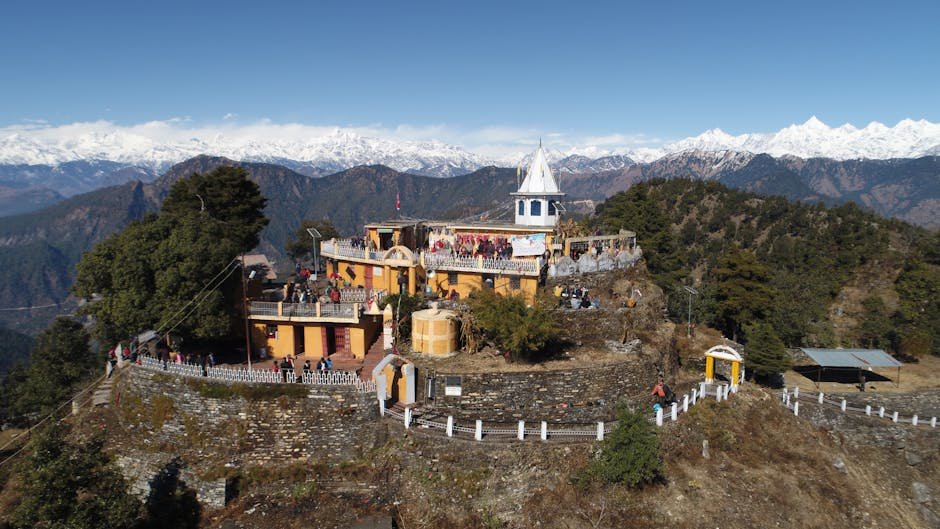 Himachal’s Kartik Swami Temple in Chamba Reopens After Four-Month Winter Closure Stunning aerial view of Kartik Swami Temple surrounded by mountains in India.