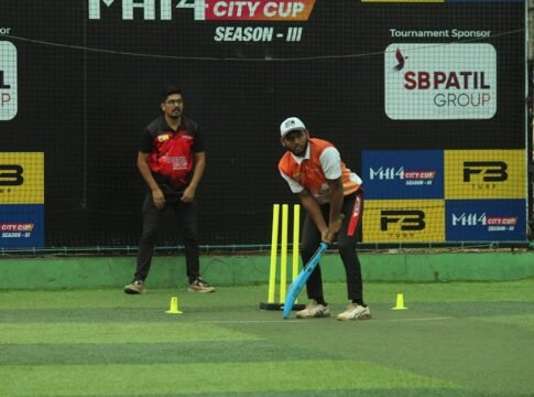 Two cricket players on a turf field during the MH14 City Cup Season III match. Two cricket players on a turf field during the MH14 City Cup Season III match.