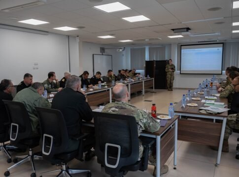 U.S. Air Force 1st Lt. Virginia Walsh, 435th Contingency Response Support Squadron flight commander and logistics readiness air advisor, provides a final briefing to U.S. Army COL. Kenneth “K.C.” Eva…