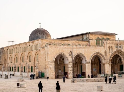 View of Al-Aqsa Mosque with visitors, capturing the architectural beauty in Jerusalem.
