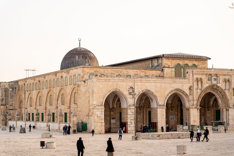 Al-Aqsa Mosque Reopens in Jerusalem After 40-Day Israeli Closure View of Al-Aqsa Mosque with visitors, capturing the architectural beauty in Jerusalem.