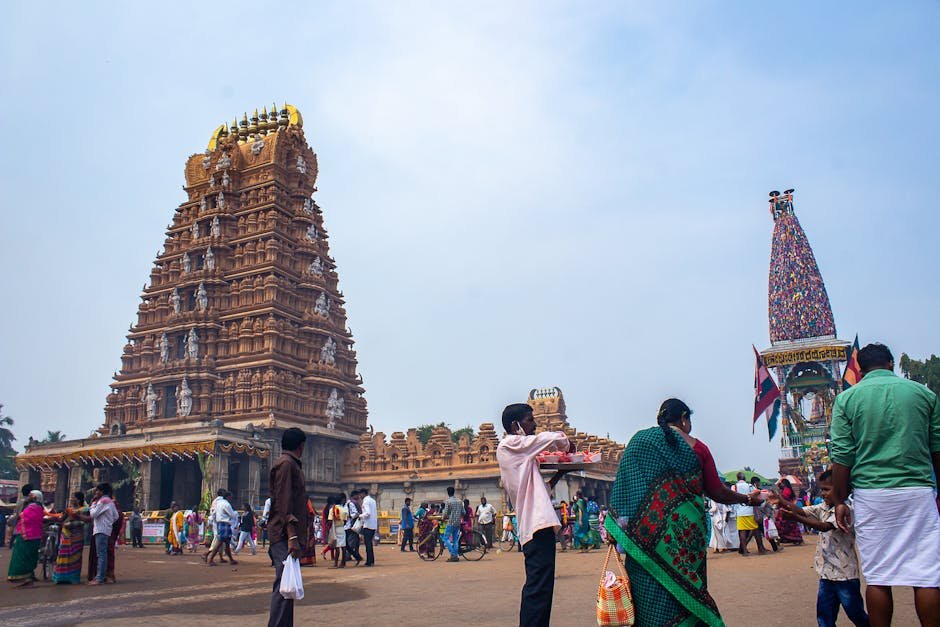 Karnataka to Add 1,000 Rooms to Kukke Subrahmanya Temple Accommodation A busy day at a historic temple in India with numerous visitors and traditional rituals.