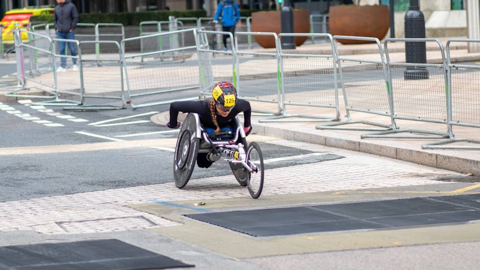 India Modernising Military, Demonstrating Power: US Official at Shangri-La Dialogue A dedicated athlete competes in a marathon using a racing wheelchair on city streets.