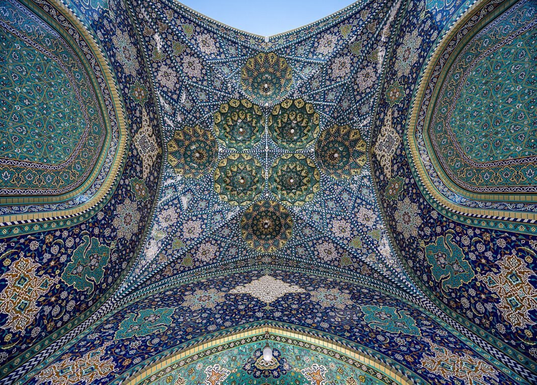 Iran’s Strategic Control Over Strait of Hormuz Challenges Western Military Superiority Bottom view of the iwan at one of the entrances at Fatima Masumeh Shrine, Qom, Iran. this picture merged from 25 pictures. 5 frames and each frame contain 5 pictures with 5 levels of exposure. HDR + …
