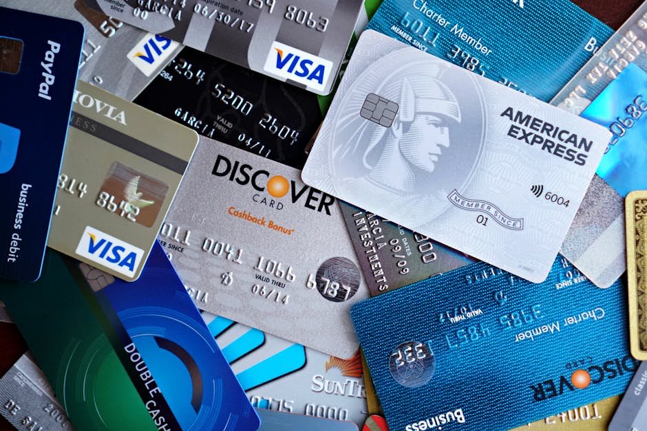 India’s Payment Landscape Transformed by UPI Credit Cards Integration Close-up image of various credit cards including Visa, Mastercard, and American Express.