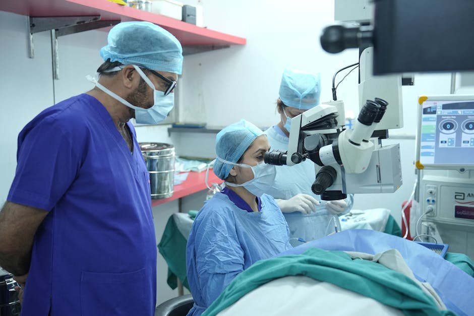 India Issues Guidelines for Childhood Myopia Amid Rising Concerns Surgeons performing eye surgery in a New Delhi hospital operating room.