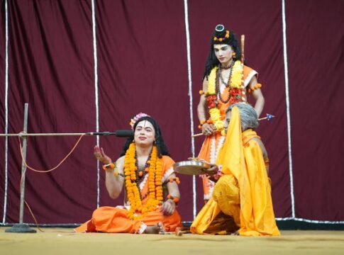 Vibrant portrayal of Indian culture with performers in traditional dress during a cultural event. Vibrant portrayal of Indian culture with performers in traditional dress during a cultural event.
