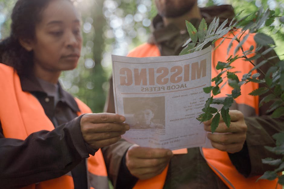 Himachal Pradesh: Four Chamba Police Personnel Suspended Over Missing Girl Case Irregularities Volunteers in forest holding a missing person poster during search operation.
