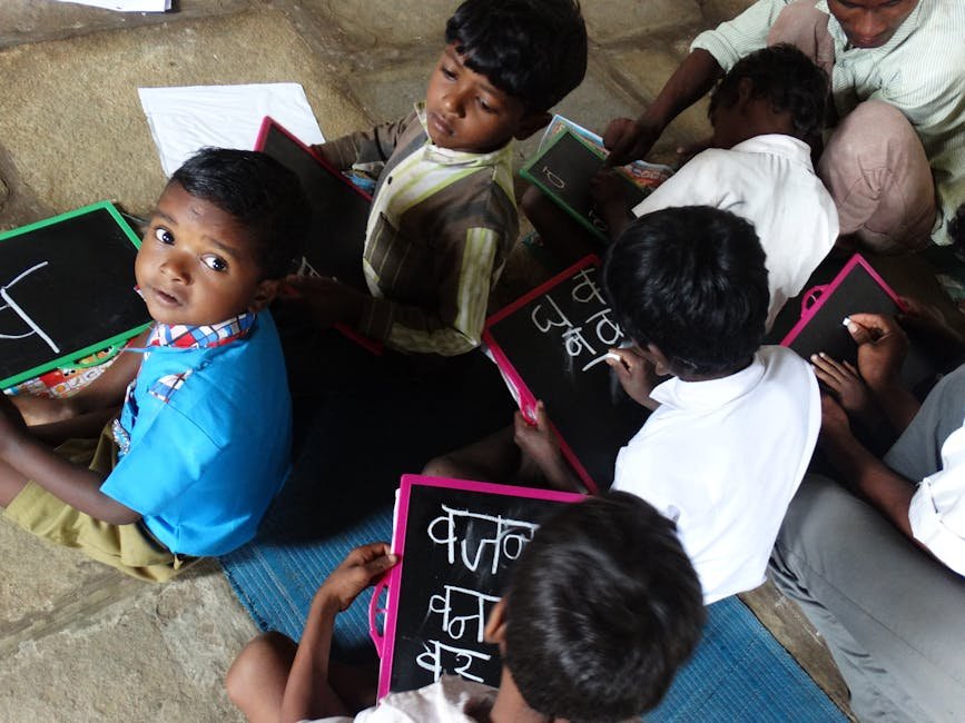 Maharashtra’s Three-Language Policy: Hindi’s Compulsory Status Uncertain Amidst Textbook Publication Delays Young students writing on slates in a village school in Melghat, India.