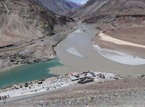 A breathtaking aerial view of a river confluence near Leh surrounded by rugged mountains. A breathtaking aerial view of a river confluence near Leh surrounded by rugged mountains.