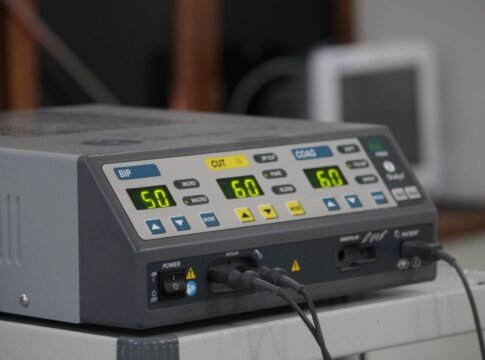 A close-up view of a medical electrosurgical generator used in surgical procedures.