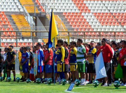 Colorful gathering of diverse soccer teams at a sunlit stadium. Colorful gathering of diverse soccer teams at a sunlit stadium.