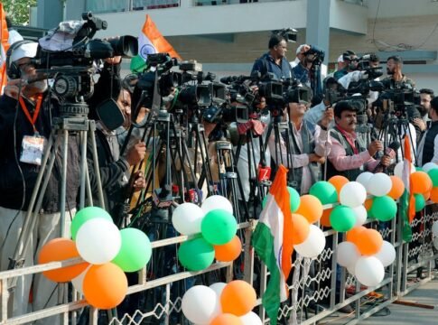 Journalists and videographers gather with cameras in Ahmedabad, capturing a vibrant scene. Journalists and videographers gather with cameras in Ahmedabad, capturing a vibrant scene.
