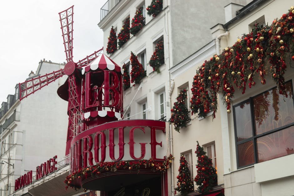 Maharashtra Child Welfare Aid Hindered by Bureaucratic Delays, Report Reveals Moulin Rouge in Paris festively decorated with Christmas ornaments and red windmill.