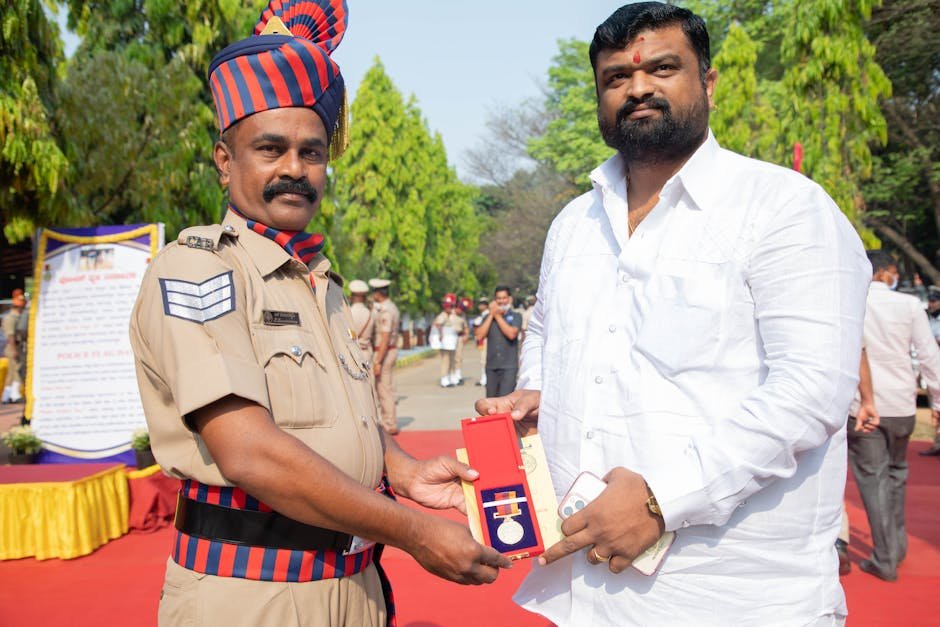 Karnataka Ex-CM Bommai Emphasizes Vishwakarma Community’s Pivotal Role in Nation-Building Police officer awarded honorary medal at outdoor ceremony