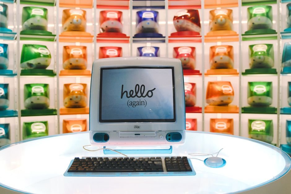 India: Apple Hikes MacBook, iPad Prices by Up to 42% Amidst Soaring Chip Costs Retro Apple iMac G3 display showcasing technology evolution with colorful computer units.