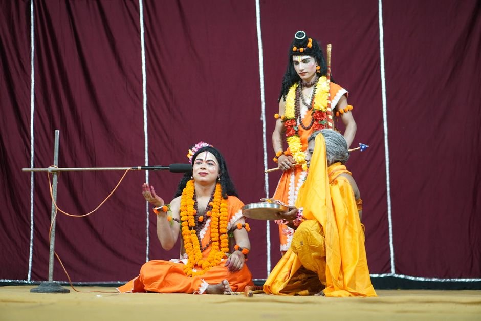Vibrant portrayal of Indian culture with performers in traditional dress during a cultural event.
