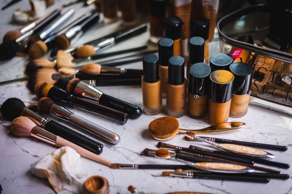 Bengaluru’s Church Street to Host Weekly Busking Sessions for Independent Musicians A variety of makeup brushes and foundation bottles arranged on a marble surface, showcasing beauty essentials.