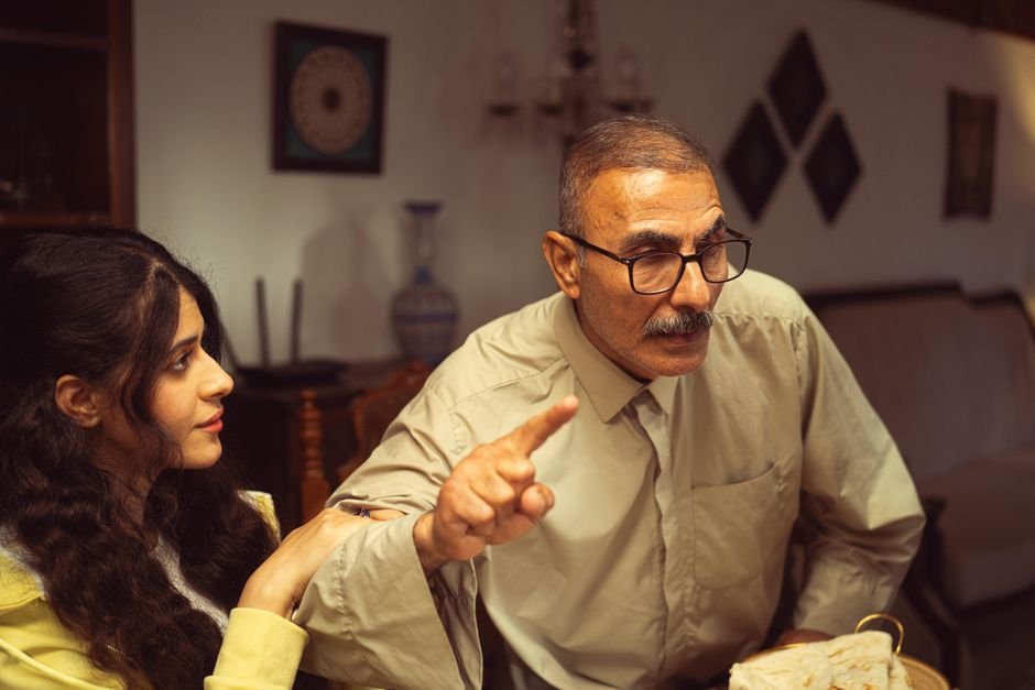 Pir Panjal Region: Army Chief Reviews Security Grid Along LoC An older man and young woman having an intense discussion in a cozy living room setting.