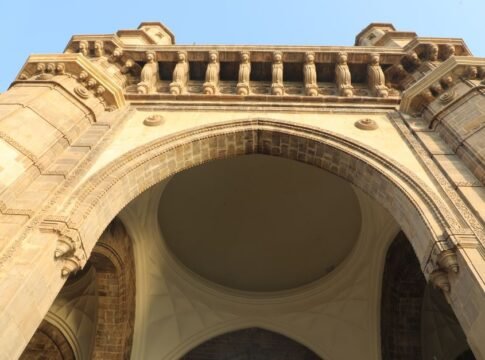 Detailed view of the Gateway of India archway in Mumbai, showcasing its architectural grandeur.