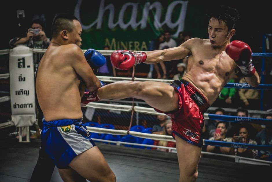 Arunachal Pradesh’s Sonam Zomba Crowned First Karma Fight League World Champion in Sri Lanka Dynamic moment in a Muay Thai match showcasing powerful kicks in a thrilling competition.