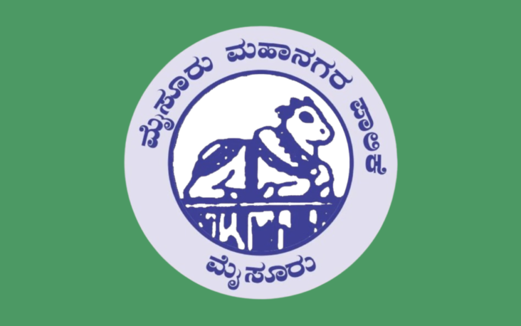 Karnataka: MCC Intensifies Campaign Against Littering and Plastic Use on Chamundi Hills Flag of Mysore Corporation